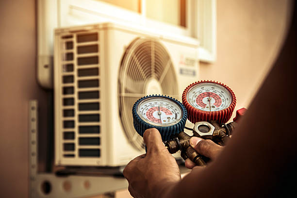 Professional Hvac technician working in Axis, AL